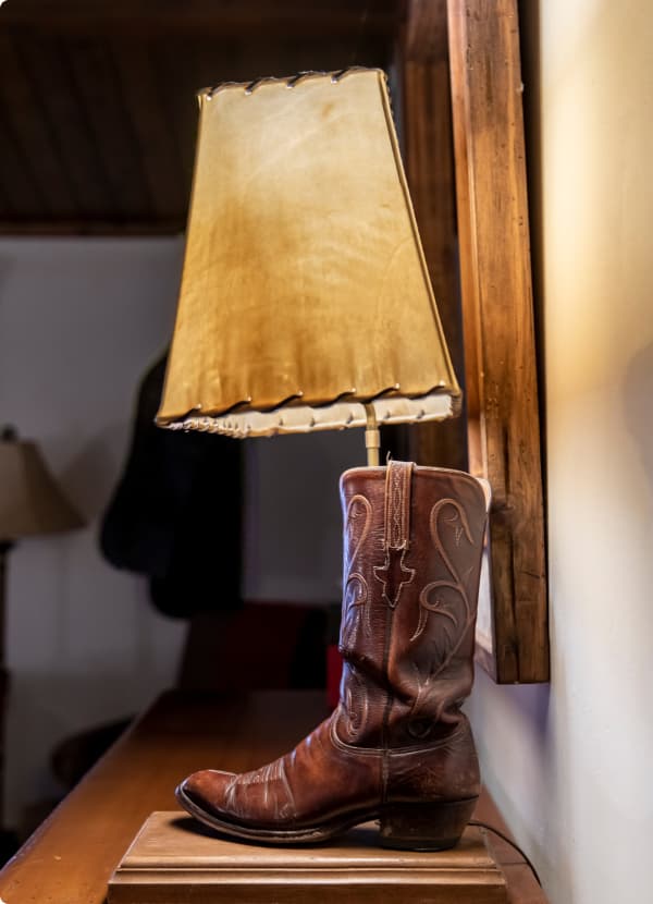 a unique, cowboy boot lamp at trinchera ranch colorado